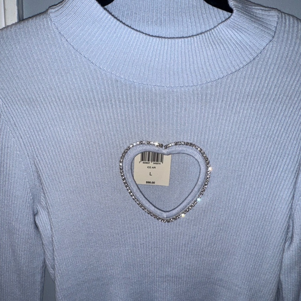 Chic Light Blue Top with Heart Accent